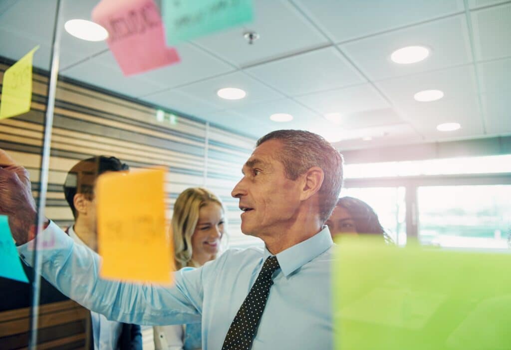 Businessman showing the strategy to the staff