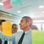 Businessman showing the strategy to the staff